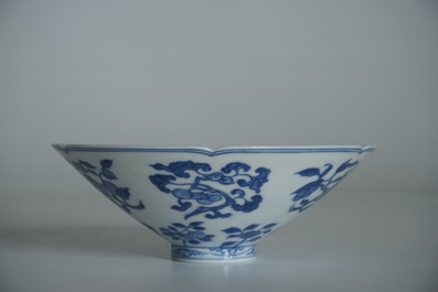 A Chinese blue and white bowl with flowers and fruits, 19th C.