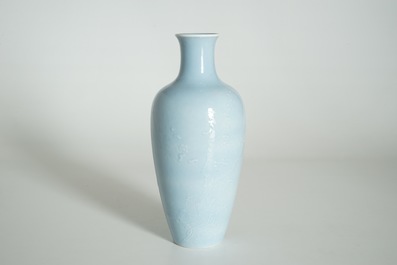 A Chinese monochrome lavender-blue vase with underglaze design, Yongzheng mark, 19th C.