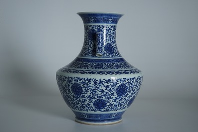 A Chinese blue and white lotus scroll hu vase, Qianlong mark, 19th C.