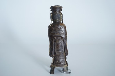 Een Chinese deels vergulde en polychrome bronzen figuur van Wenchang Dijun, Ming