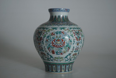 A Chinese famille rose vase with ladies in a garden, 19/20th C.