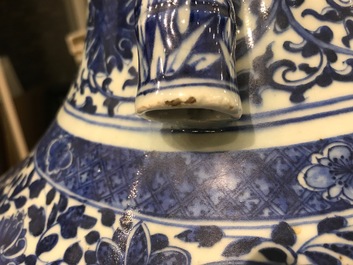 A Chinese blue and white lotus scroll hu vase, Qianlong mark, 19th C.