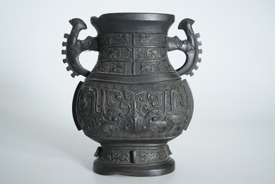 A Chinese archaistic bronze two-handled hu vase, 19th C.