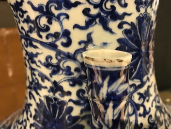 A Chinese blue and white lotus scroll hu vase, Qianlong mark, 19th C.