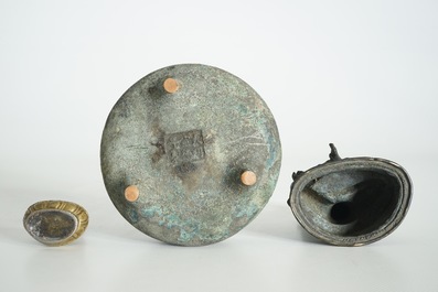 A Chinese Xuande mark bronze censer, a bronze model of Tara and a gilt copper alloy figure, Ming and later