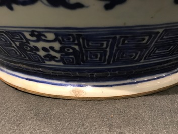 A Chinese blue and white lotus scroll hu vase, Qianlong mark, 19th C.