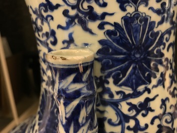 A Chinese blue and white lotus scroll hu vase, Qianlong mark, 19th C.