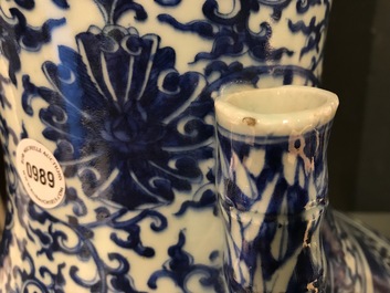 A Chinese blue and white lotus scroll hu vase, Qianlong mark, 19th C.