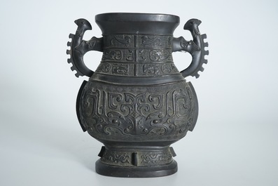 A Chinese archaistic bronze two-handled hu vase, 19th C.