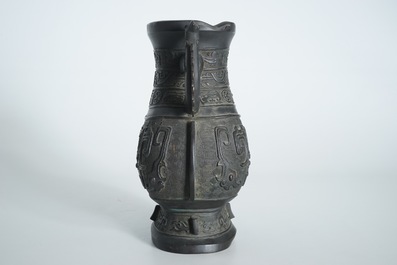 A Chinese archaistic bronze two-handled hu vase, 19th C.