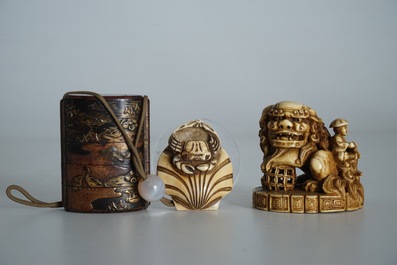 A Japanese laquer inro with ivory netsuke and agate ojime, and a Buddhist lion netsuke, Meiji/Taisho