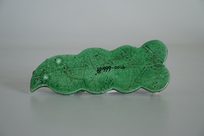 A Chinese verte biscuit model of a dragon on an artemisia leaf, Kangxi