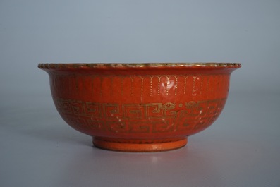 A Chinese coral-glazed and gilt bowl, Daoguang mark, 19th C.