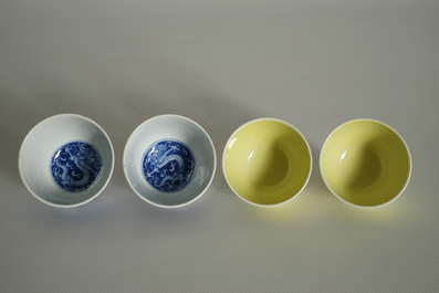 Two pairs of Chinese tea bowls in monochrome yellow and blue and white, 19/20th C.