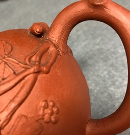 A Chinese Yixing teapot with applied squirrels and vines, Kangxi