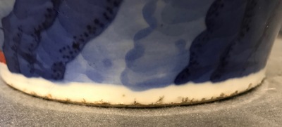 A pair of Chinese wucai baluster vases with carved lids and bases, 19th C.