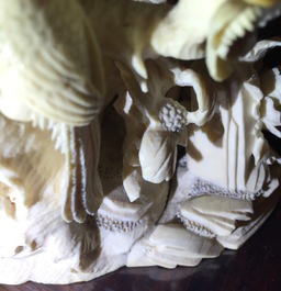 A Chinese carved ivory group of playing children, 2nd quarter 20th C.