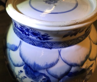 A Chinese blue and white globular vase with wooden cover and stand, Kangxi