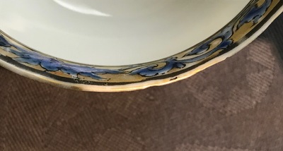 A Chinese anhua decorated cup and saucer with polychrome deer design, Yongzheng