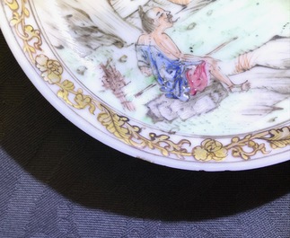 A Chinese famille rose cup and saucer with fine figural design, Yongzheng