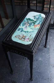 A Chinese famille rose plaque mounted as a table inset, 19th C