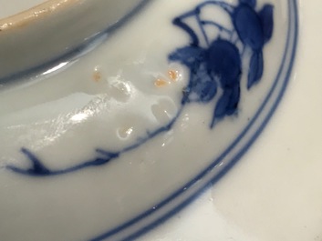 A small Chinese blue and white plate with a monk near the water, Transitional period