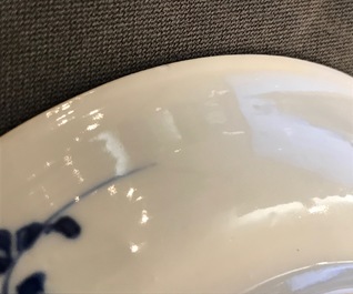 A Chinese blue and white cup and saucer with Madonna and child, Kangxi