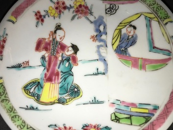 Een Chinese famille rose kop en schotel met figuren in een tuin, Yongzheng