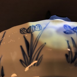 A pair of Chinese blue and white plates with fine landscapes, Kangxi