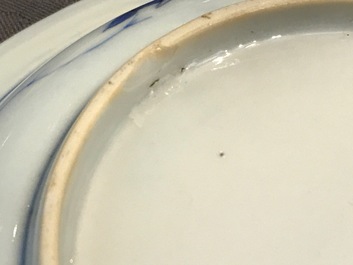 A small Chinese blue and white plate with a monk near the water, Transitional period