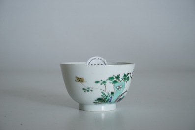 A Chinese famille verte cup and saucer with yin-yang mark, Kangxi