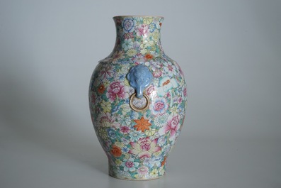 A Chinese famille rose millefleurs hu vase, Qianlong mark, 19/20th C.