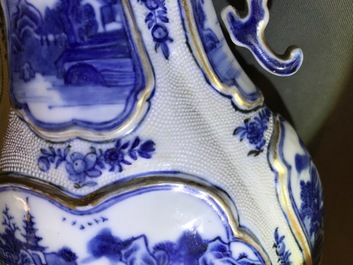 A garniture of three Chinese blue and white covered vases with landscape design, Qianlong