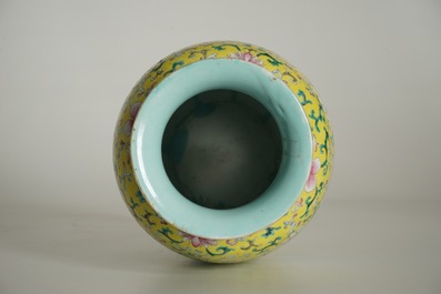 A Chinese yellow-ground famille rose vase, Qianlong mark, 19/20th C.