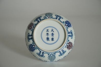 A Chinese doucai saucer plate with Shou-characters, Yongzheng mark, 19/20th C.