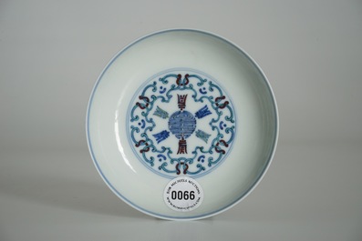 A Chinese doucai saucer plate with Shou-characters, Yongzheng mark, 19/20th C.
