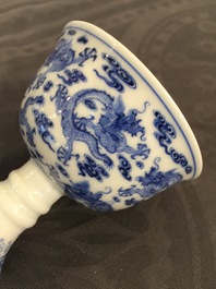 A Chinese blue and white nine-dragon stem cup, Yongzheng mark and poss. of the period