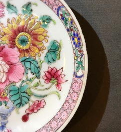 Une tasse et soucoupe en porcelaine de Chine famille rose &agrave; d&eacute;cor d'un vase fleuri, Yongzheng