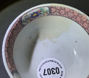 Une tasse et soucoupe en porcelaine de Chine famille rose &agrave; d&eacute;cor d'un vase fleuri, Yongzheng