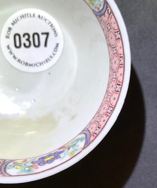 A fine Chinese famille rose cup and saucer with a flowervase, Yongzheng