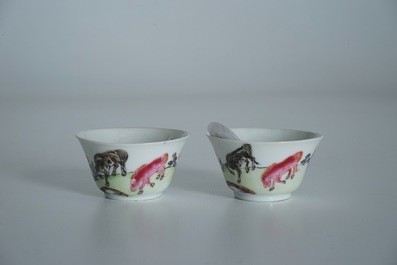 A pair of Chinese famille rose cups and saucers with horse design, Yongzheng/Qianlong