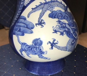 A Chinese blue and white relief-decorated hu vase with mythical beasts, Chenghua mark, 19/20th C.