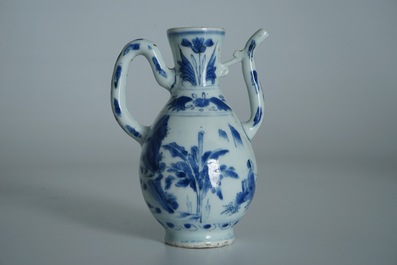 A Chinese blue and white jug with figures in a landscape, Transitional period