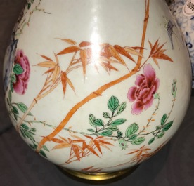 Un vase de forme yuhuchunping en porcelaine de Chine famille rose, mont&eacute; en bronze, marque de Qianlong, 19/20&egrave;me