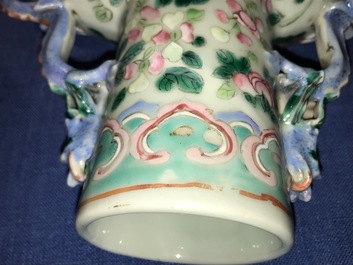 A Chinese famille rose moonflask with a court scene, 19th C.