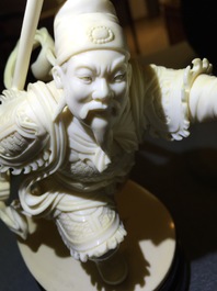 A Chinese ivory warrior and Chang'e on wooden stands, 19/20th C.