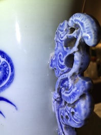 A tall Chinese blue and white celadon-ground vase with a dragon and a phoenix, 19th C.