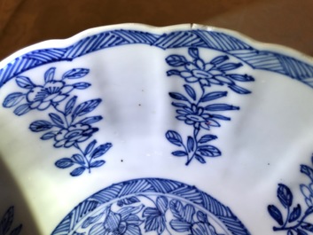 A pair of Chinese blue and white bowls on foot, Kangxi