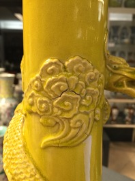 A tall Japanese Awaji monochrome yellow vase with applied dragon, Meiji, ca. 1900