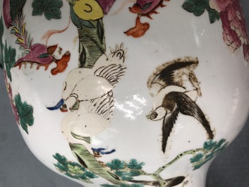 A tall Chinese famille rose vase with pheasants and peacocks, 19th C.